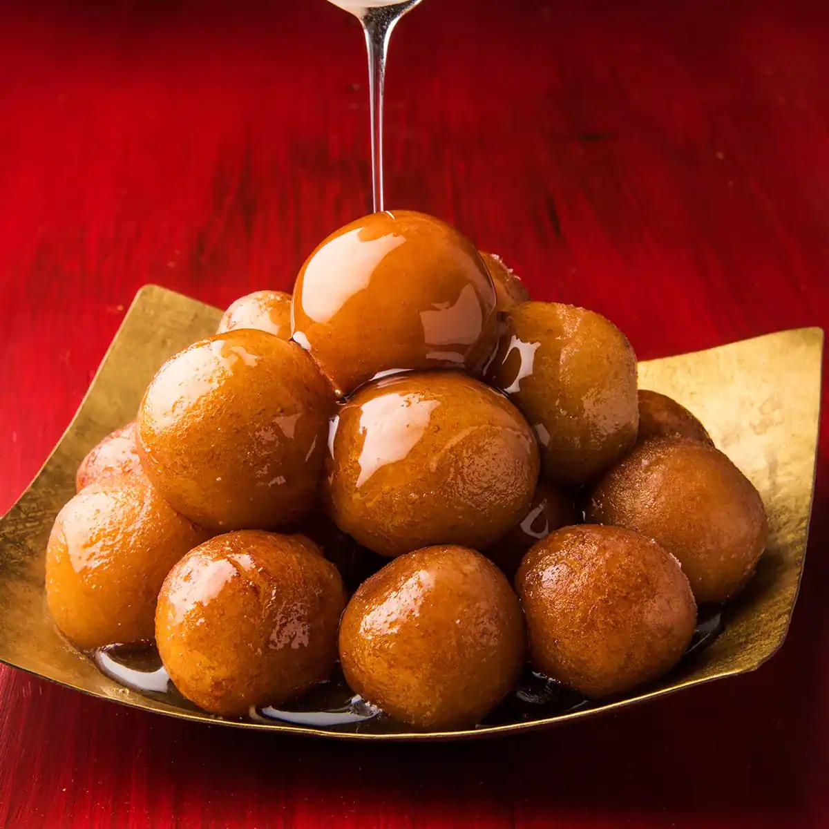 Buñuelos en Almíbar